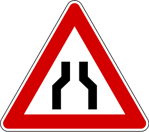 Road narrows on both sides sign in Slovenia