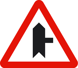 Junction with a minor road sign in Spain
