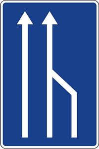 Lane ends sign in Spain