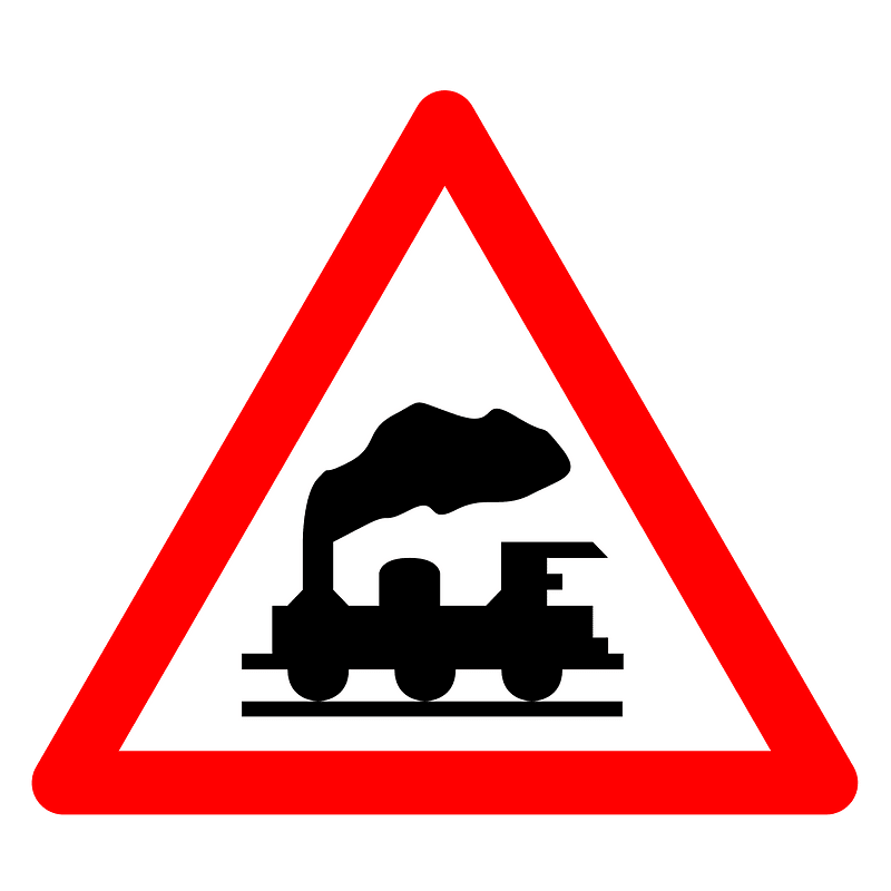 Level crossing without barriers ahead sign in Spain
