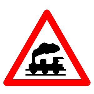 Level crossing without barriers ahead sign in Spain