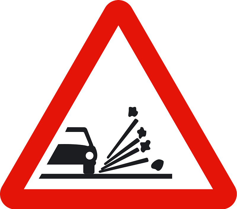 Loose road surface sign in Spain