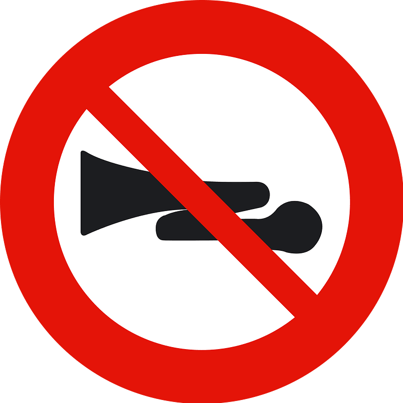 No horns or excessive motor noise sign in Spain