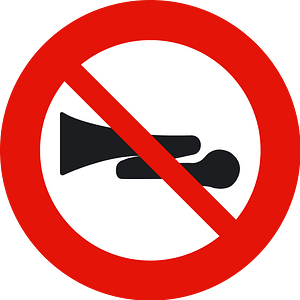 No horns or excessive motor noise sign in Spain