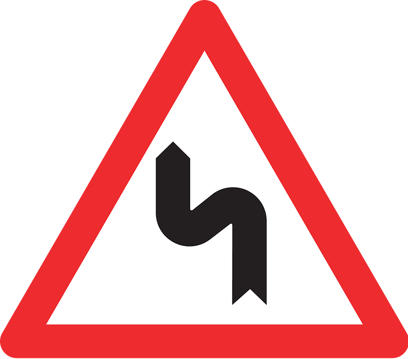 Double bend ahead sign in Switzerland