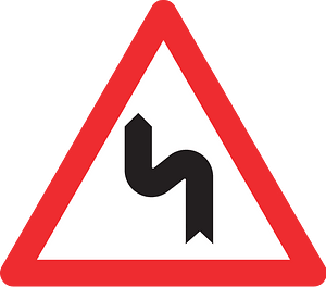 Double bend ahead sign in Switzerland