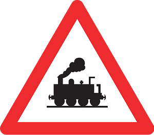 Level crossing without barriers ahead sign in Switzerland