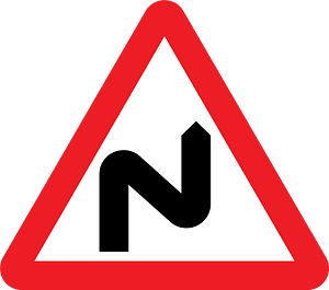 Double bend ahead sign in UK