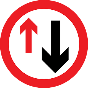 Give way to oncoming traffic sign in UK