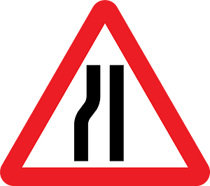 Road narrows on one side sign in UK