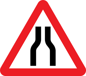 Road narrows on both sides sign in UK