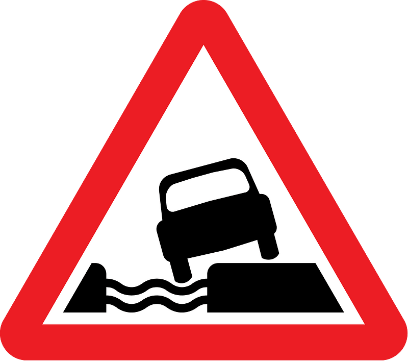 Unprotected quayside or riverbank sign in UK