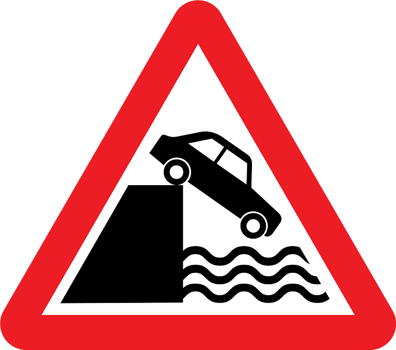 Unprotected quayside or riverbank sign in UK