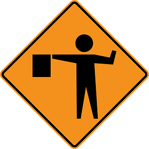 Flagman Ahead sign in United States