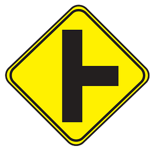 Junction with a side road ahead sign in Uruguay