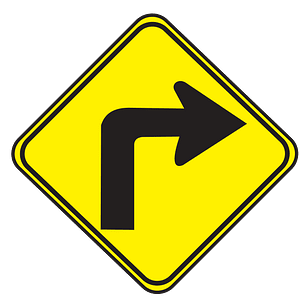 Sharp curve ahead sign in Uruguay