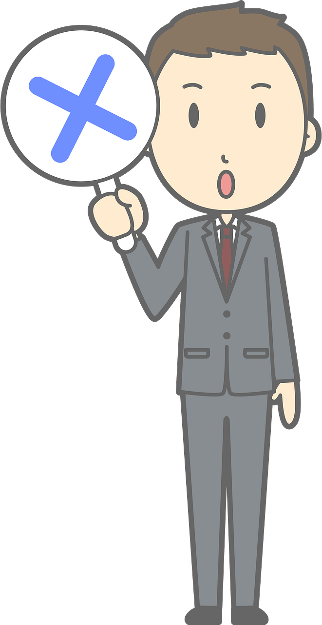 (Nathan) Businessman is Holding an X Sign