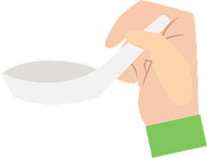 Hand is Holding a Chinese Spoon
