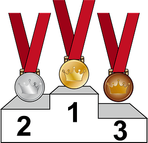 Gold, Silver, and Bronze Medals on a Podium