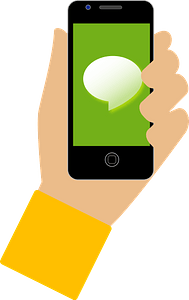 Hand Holding a Smartphone with Speech Bubble