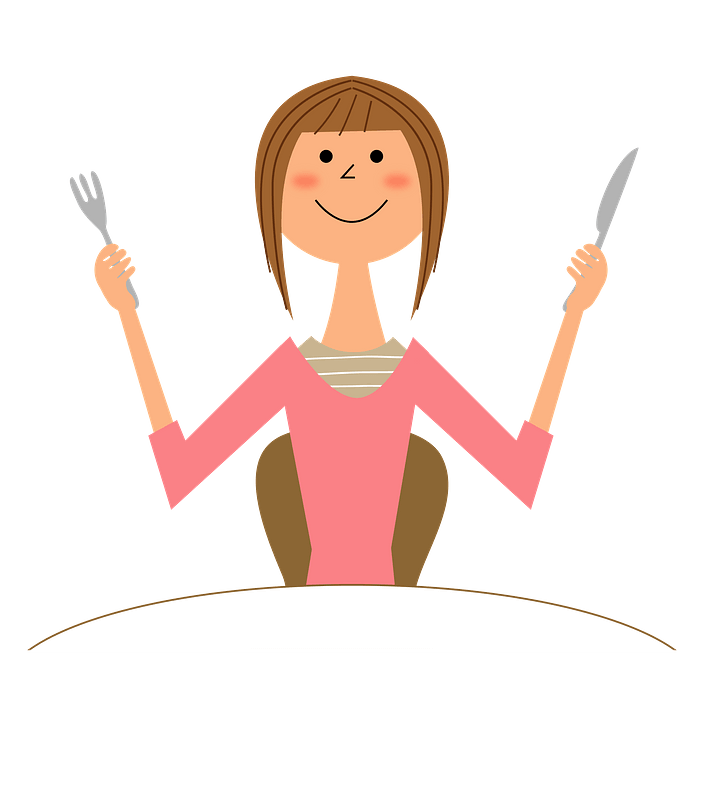Woman Is at the Table with Fork and Knife