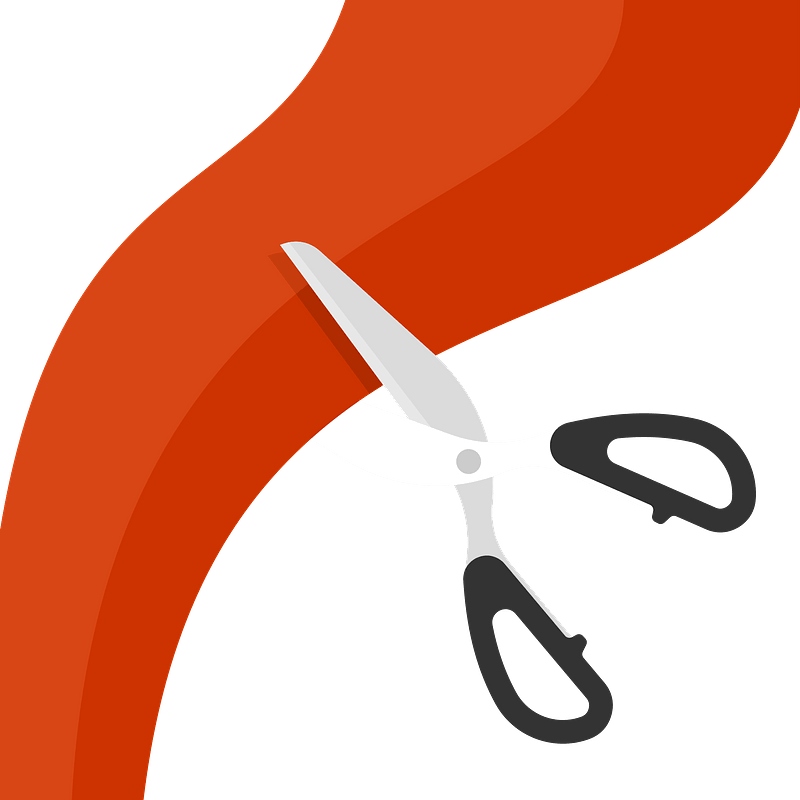 Scissors cutting ribbon