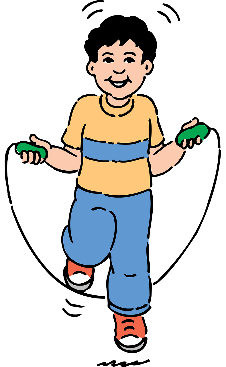 Boy jumping over a rope