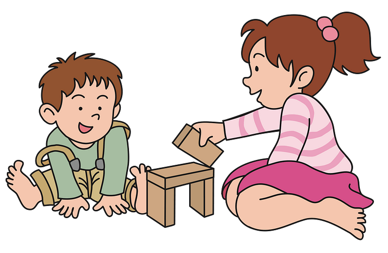 Boy and girl playing on the floor