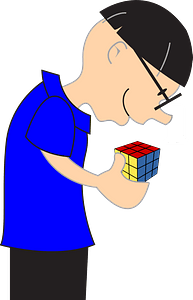 Boy playing with a magic cube