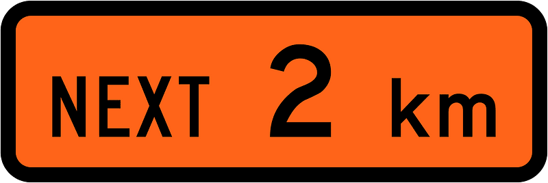 New Zealand road sign W1-1.1A (2 km)