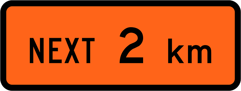 New Zealand road sign W1-1.1B (2 km)