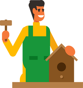Man building a birdhouse