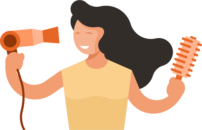 Woman dries her hair