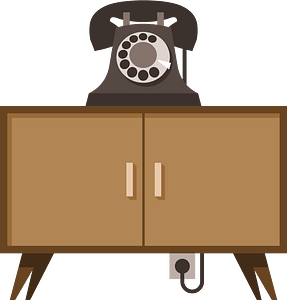 Vintage nightstand and a telephone