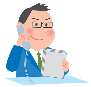 Businessman in Glasses Talks on a Telephone
