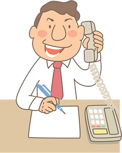 Businessman Talks on a Telephone