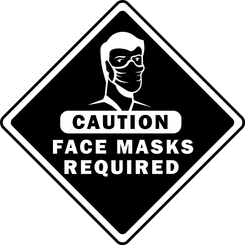 Face masks required sign caution