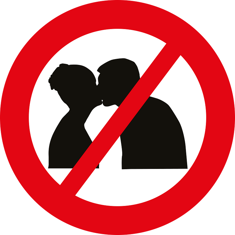 No kissing signs