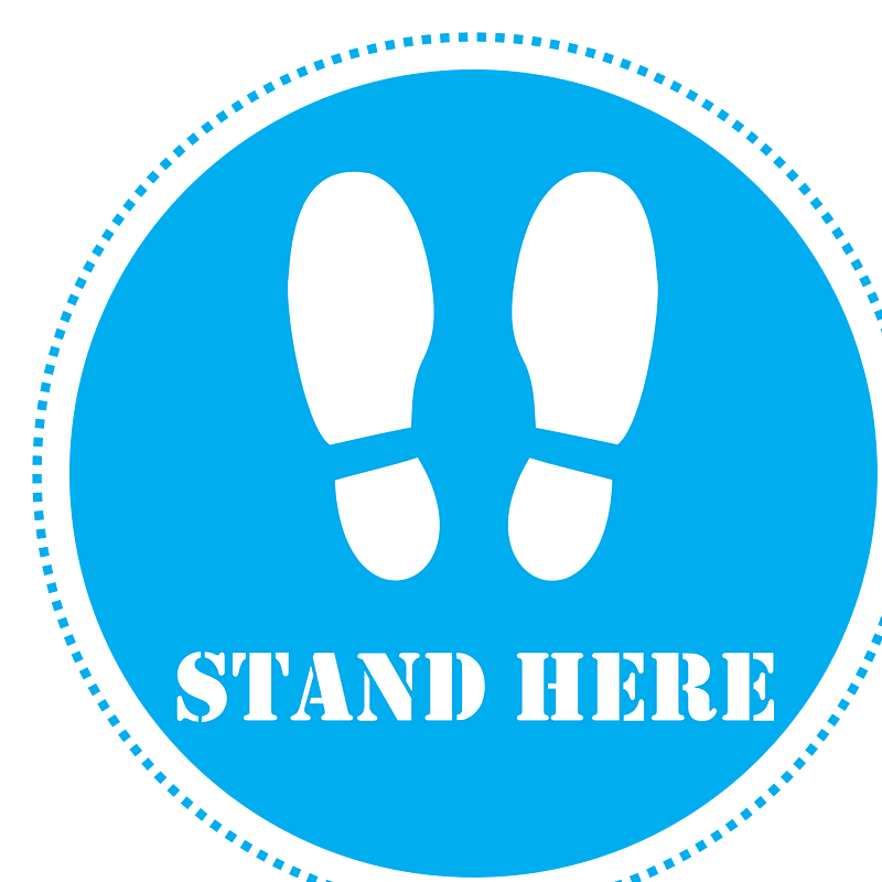 Stand here sign