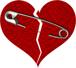Broken heart with pin