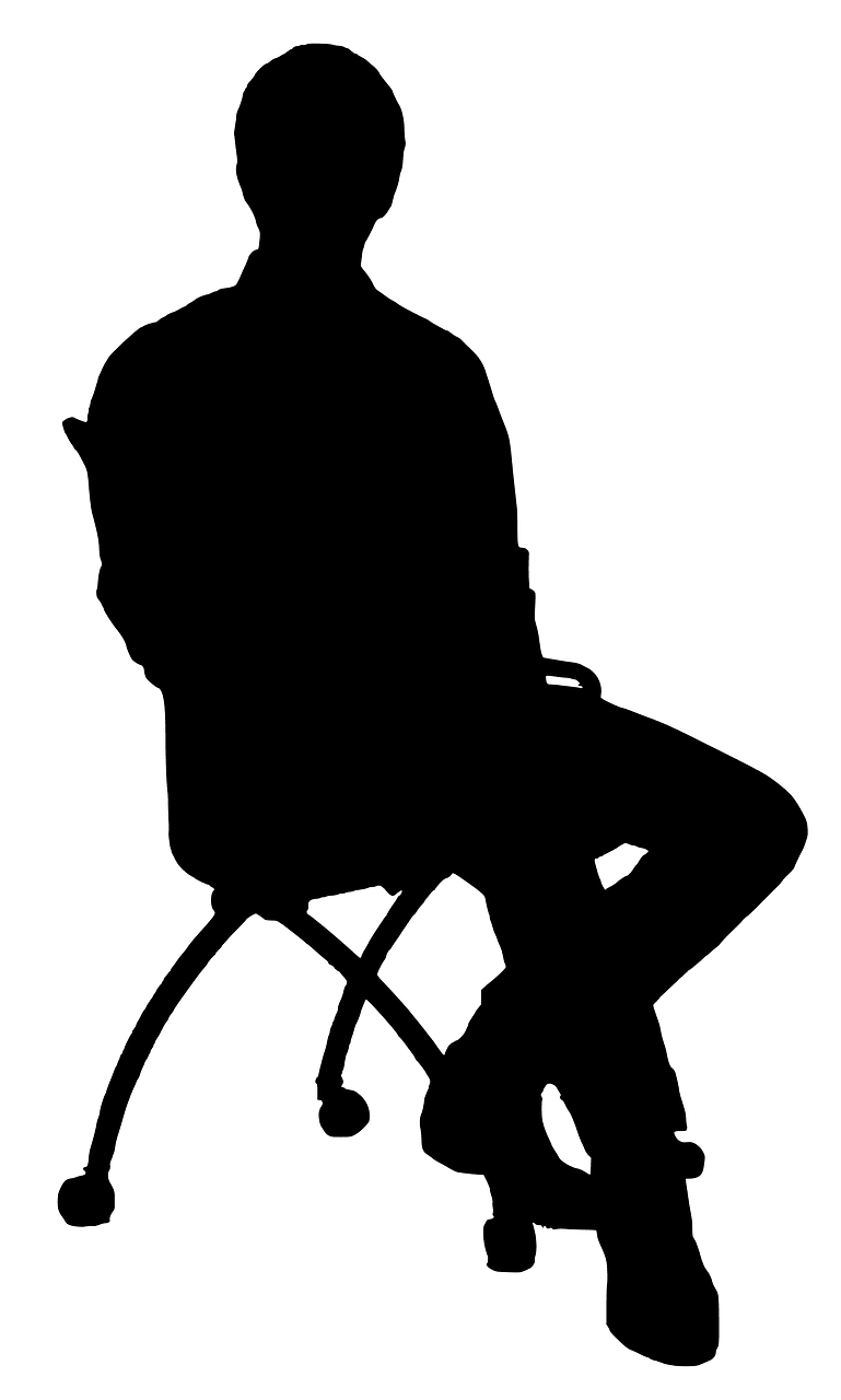 Silhouette of man on chair