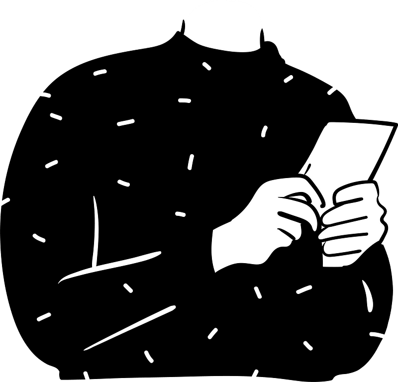 Person in sweater with a paper