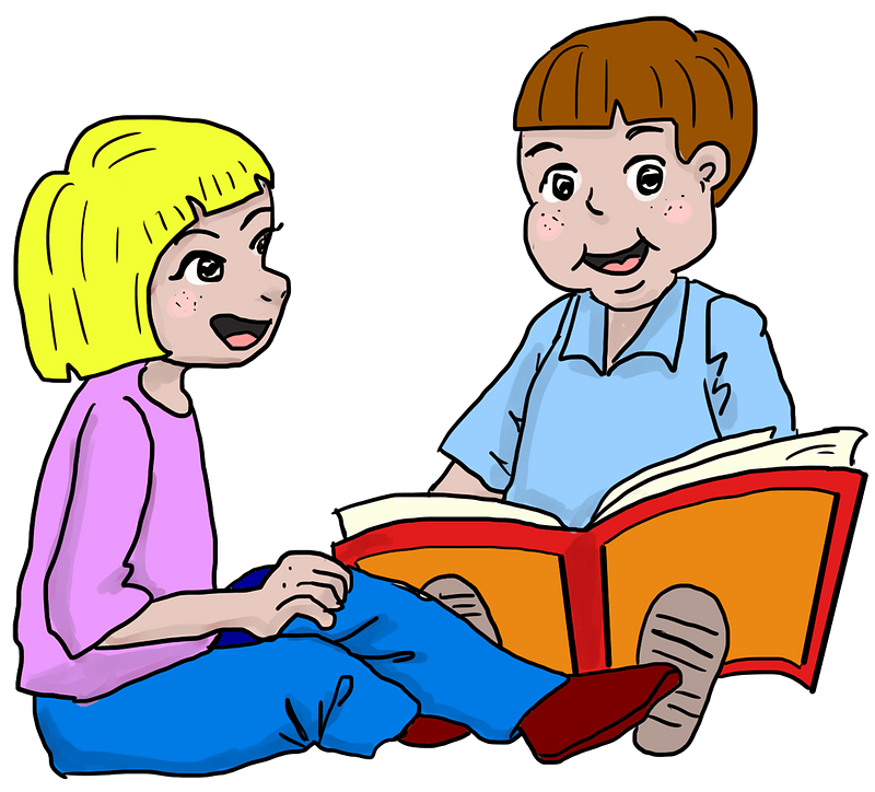 Schoolkids reading a book
