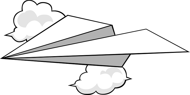 Paper plane in clouds