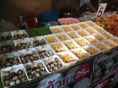 Thai food stall with seafood on weekend night market in Phuket photo