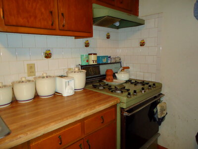 Kitchen Counter and Stove photo