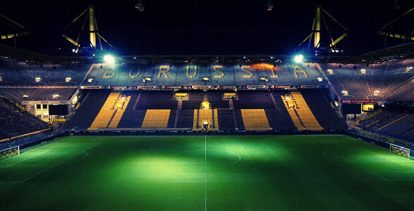 Empty Night Football Stadium in the Lights photo