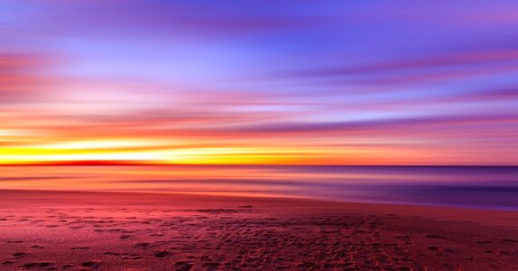 Beautiful landscape, sunset, and dusk on the beach at Sydney, New South Wales, Australia photo