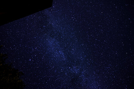 Galaxy and Stars above the Cabin and Trees at Algonquin Provincial Park, Ontario photo