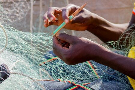Fishing nets weaving people photo